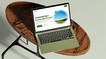 Professional working on a laptop in a tech environment